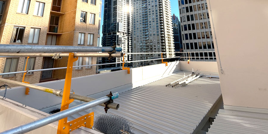 Non-Invasive Parapet Clamp System Edge Protection - CBD Project